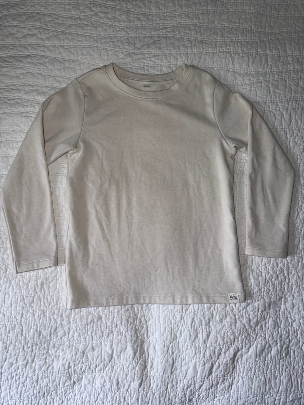 Uniqlo kids’ long-sleeve HeatTech thermal top